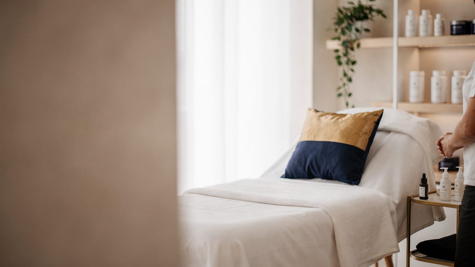 Calm, softly lit treatment room at Beautification Station in Littleton